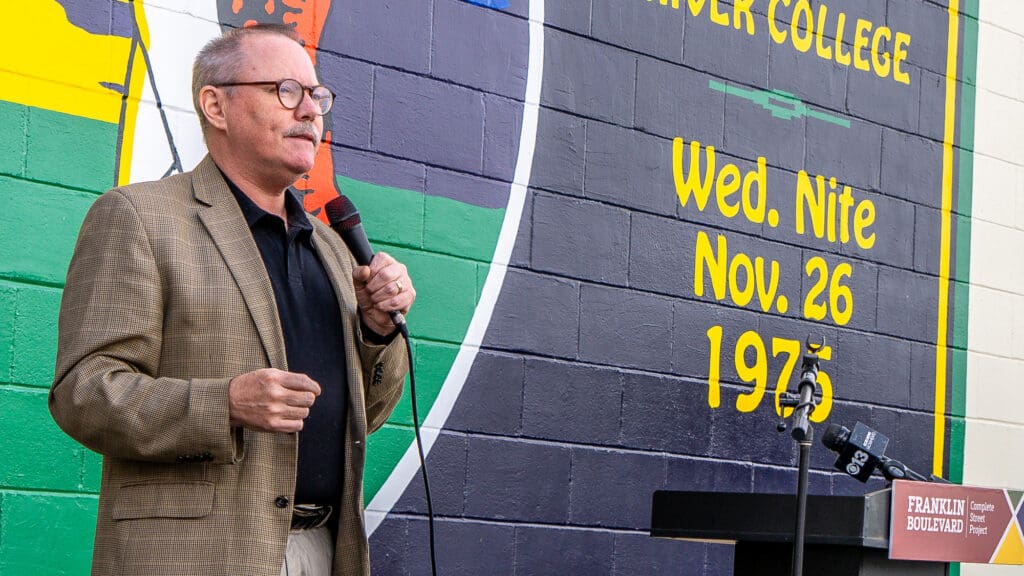 Man speaks with microphone