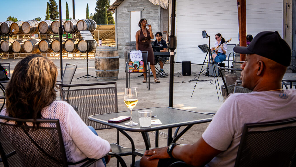couple watching musicians peforming
