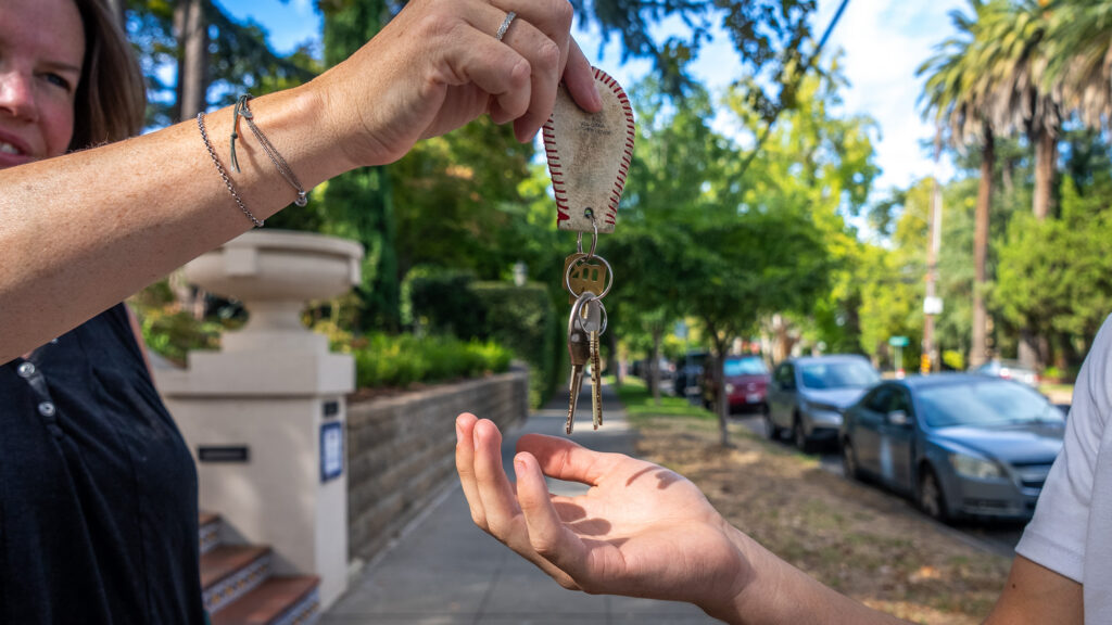 handing keys to son