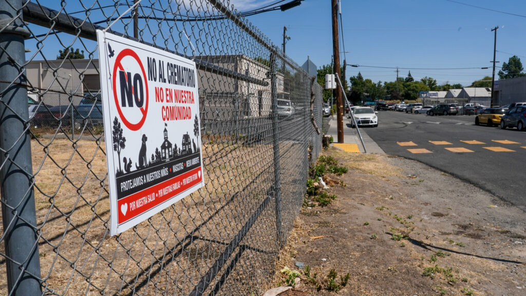 Sign on a fence