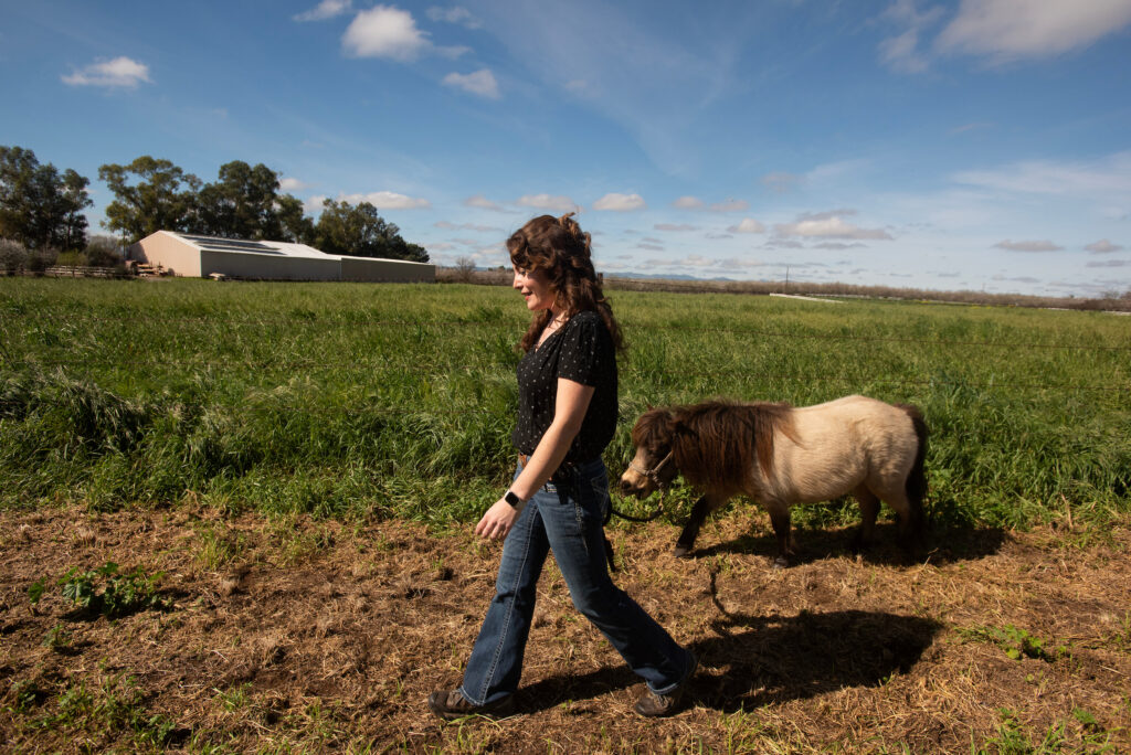 Woman with a mini horse