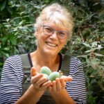 woman holding fruit