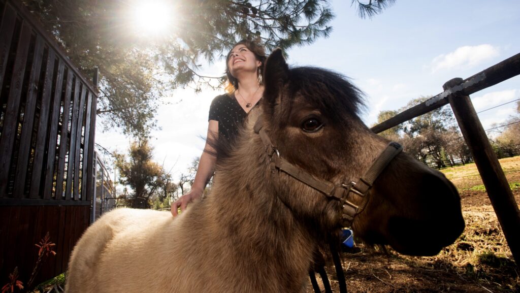 Woman with mini horse