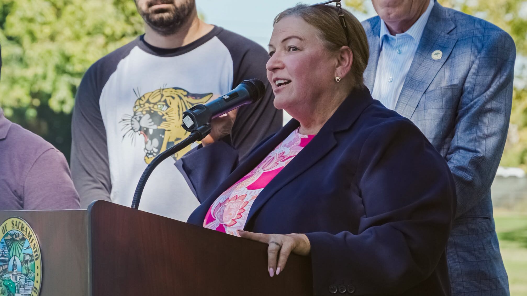 Woman speaks at podium