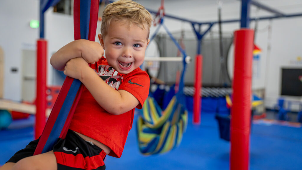 Kid swinging