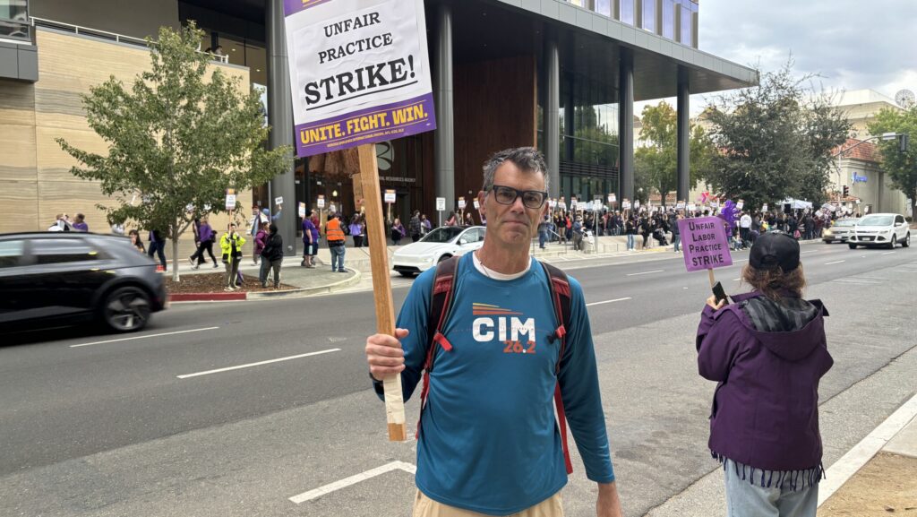 Man holding sign