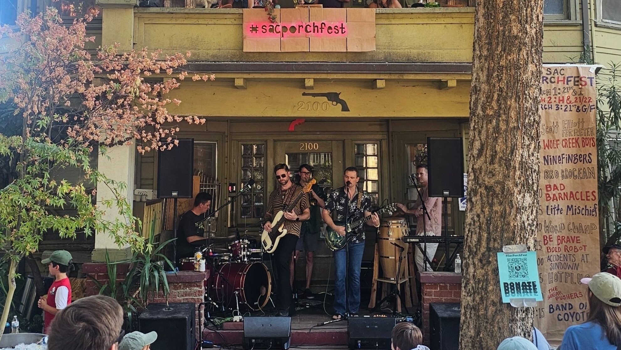 A band plays on a porch